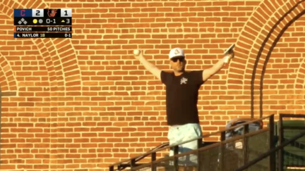 Fan catches ball at Orioles game